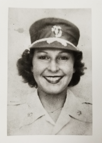 A black and white photo of Helen Hannah Campbell in a WWII Marine Corps uniform with hat. She is smiling.