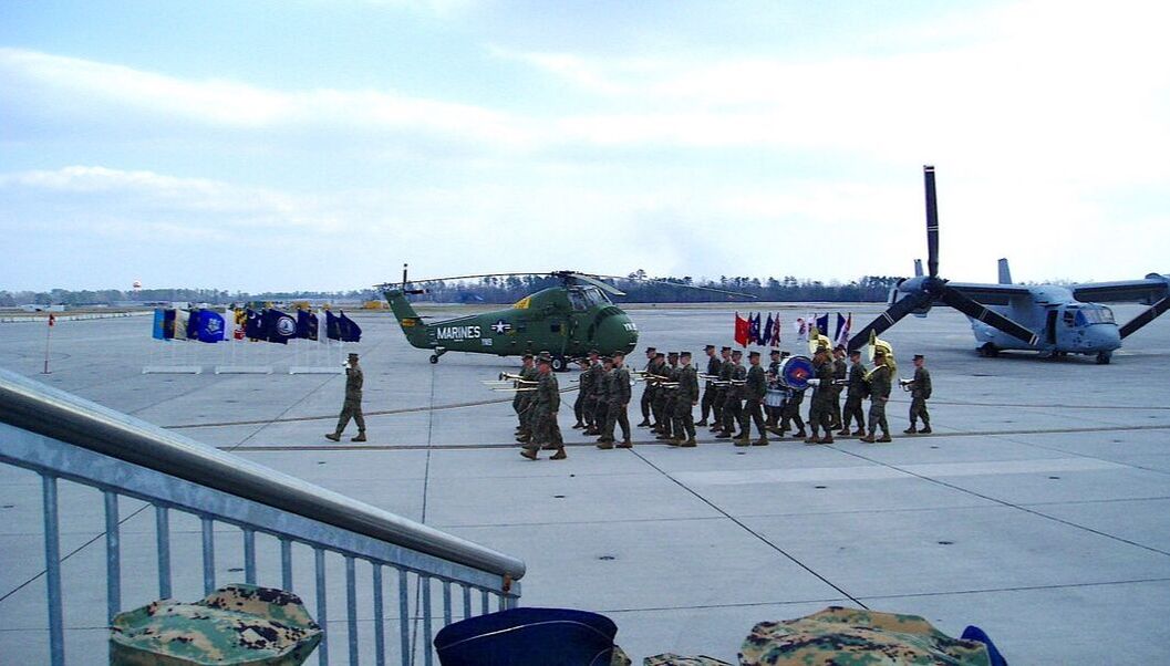 Dedication of VMM-263's activation ceremony on the flight deck with a Marine band playing 